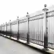 Steel boundary fence providing durable and secure property boundary solution for enhanced security and visibility in residential and commercial spaces.